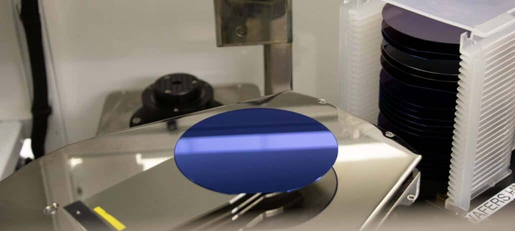 Forge Nano's Apollo ALD tool coating a semiconductor wafer